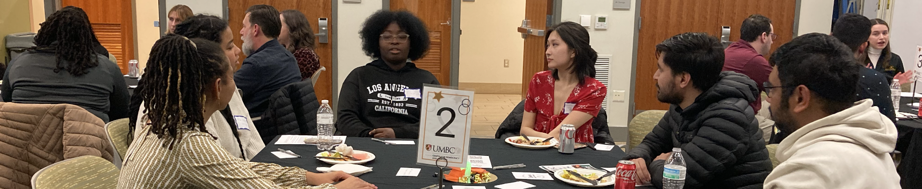 Photo of a few tables at a Dinner with Friends event